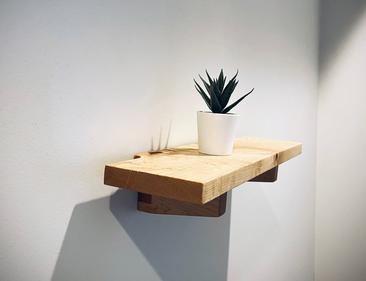 Handmade Japanese-inspired Kanso wall shelf in solid Maple, walnut or Cherry. Evokes calm, balance, and elegant simplicity.